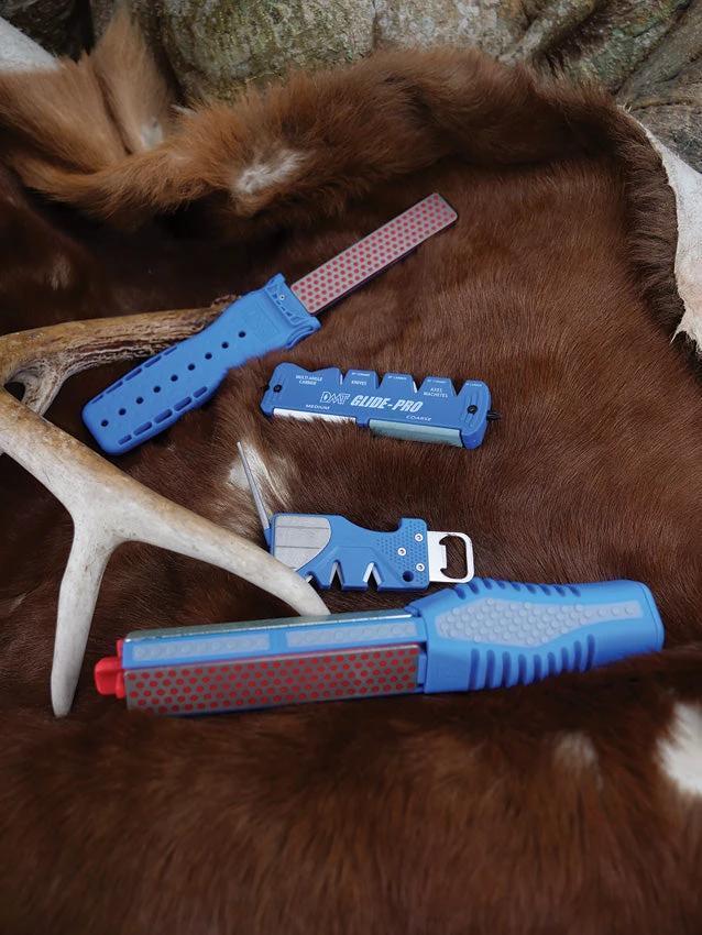 DMT Double Flip Double Sided Sharpener With Stowaway Handle And Bottle Opener For Hunters And Cooks Fine And Coarse Grit by DMT