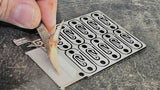 Grim Workshop Snare Card - Credit Card Size Stainless Survival Tool With Ten Hooks And Five Snare Locking Mechanisms by Grim Workshop