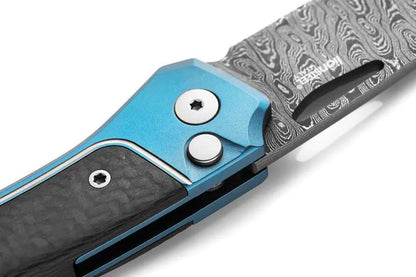 LionSteel Twain Button Lock Damascus Folding Knife For EDC Enthusiasts With Blue Titanium Handle And Carbon Fiber Inlay by LionSTEEL