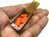 Maratac Tiny Ultem Box Silicone Holder - Amber Ultem Construction With Glow In The Dark Silicone Shell by Maratac