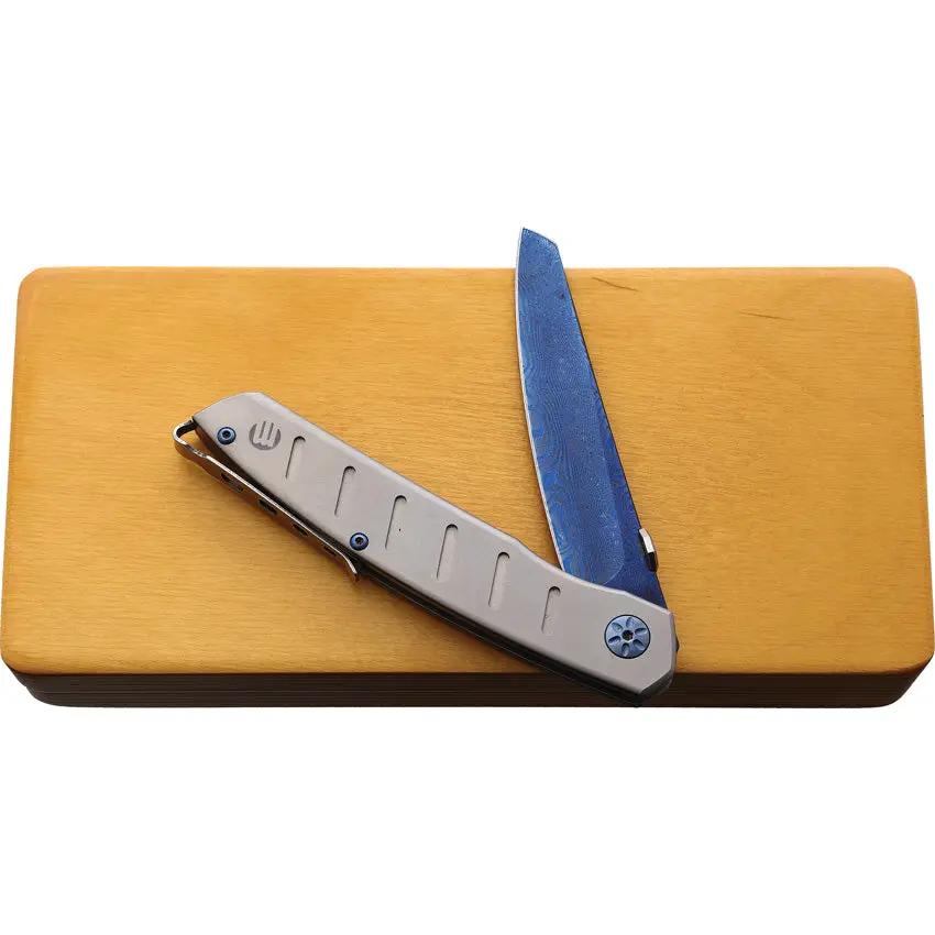 Maserin AM6 Framelock Damascus Folding Knife For EDC With Blue Atti Coated Damascus Blade And Titanium Handle by Maserin