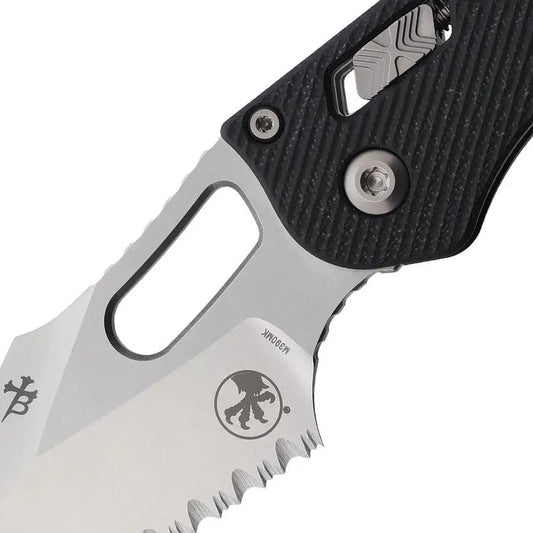Microtech Stitch S E Ram Lok Knife 5 Inch Closed 3.75 Inch Blade M390MK Serrated Black G10 EDC Tactical by Microtech