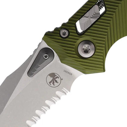 Microtech Amphibian S E Ram Lok OD Green G10 EDC Knife With 4In M390MK Blade Partial Serration Ball Bearing Thumb Stud by Microtech