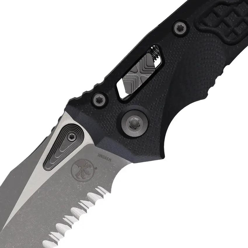 Microtech Amphibian SE Ram Lok AP Black Knife For EDC Enthusiasts With Partially Serrated M390MK Blade And G10 Handle by Microtech