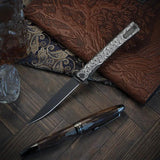 Ocaso Solstice Linerlock Scroll 10ESB - S35VN Black PVD Coated Blade, Black Titanium Handle by Ocaso