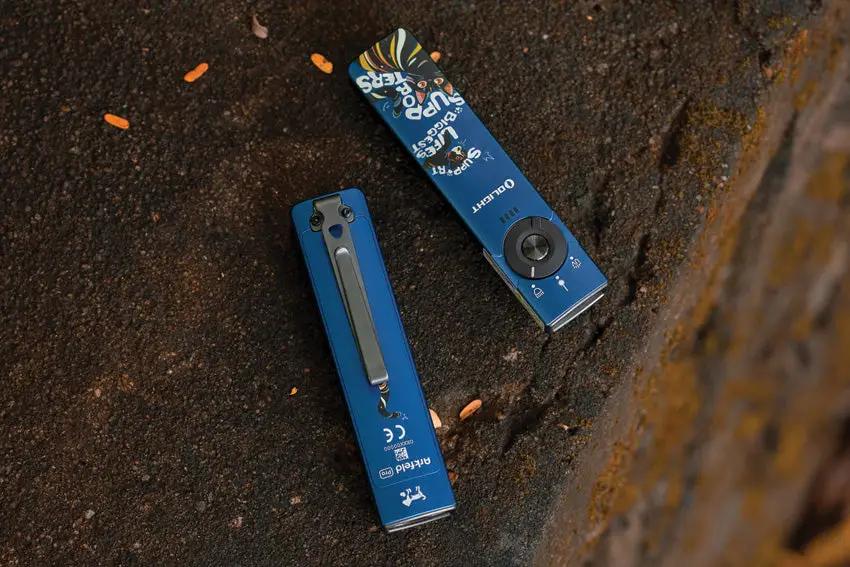 Olight Arkfeld Pro 3R Paw Edition - Rechargeable EDC Flashlight With Multi Mode Strobe And UV Green Beam by Olight