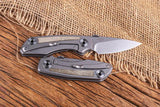 Real Steel Delta 2600 Framelock EDC Knife - S35VN Blade With Gray Titanium Frame And Green Micarta Inlay by Real Steel