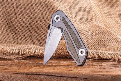 Real Steel Delta 2600 Framelock EDC Knife - S35VN Blade With Gray Titanium Frame And Green Micarta Inlay by Real Steel
