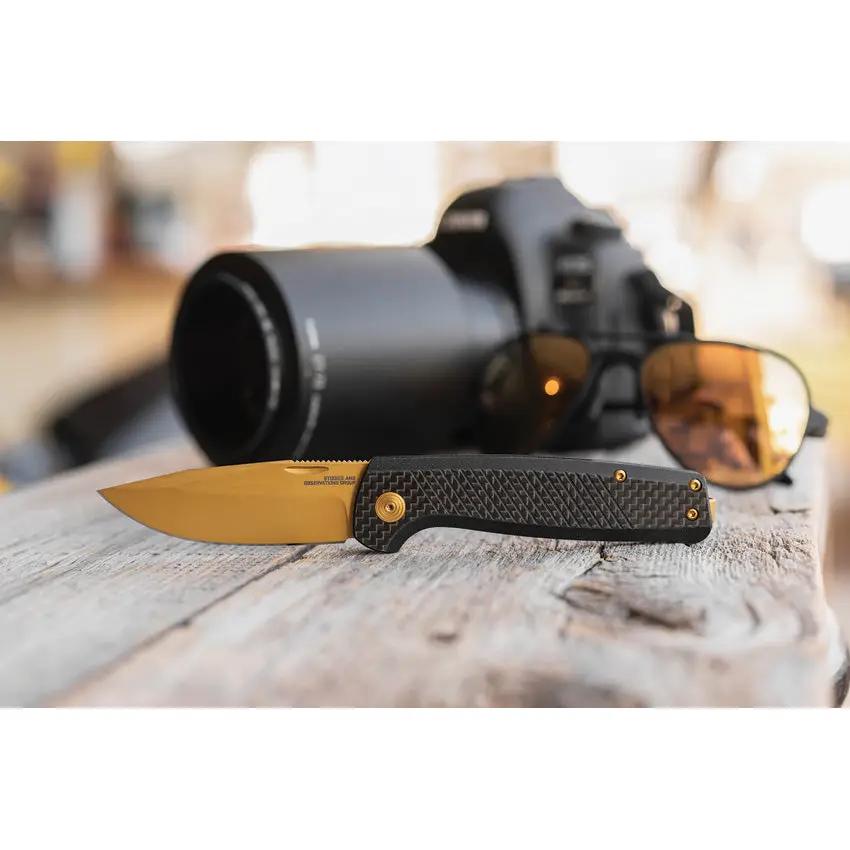 SOG Terminus SJ LTE Premium Gold Folding Knife - 3-Inch TiNi-Coated D2 Blade, EDC Ready, Black G10 CF Handle by Sog