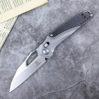 Defcon Recon Axis Lock Folding Knife - Gray Titanium Handle With Carbon Fiber Inlay, M390 Satin Blade by Defcon