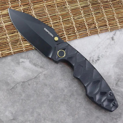 Defcon Linerlock Knife Black Gold TD004F-2 - 3.25-Inch Black Coated 14C28N Sandvik Stainless Blade With Gold Accents by Defcon