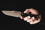 TOPS Team Jackal Survivor TMJK5S Fixed Blade Knife for Survivalists Thumb Jimping 5 Inch 1095 Steel Full Tang G10 Handle by Black Country Outdoor