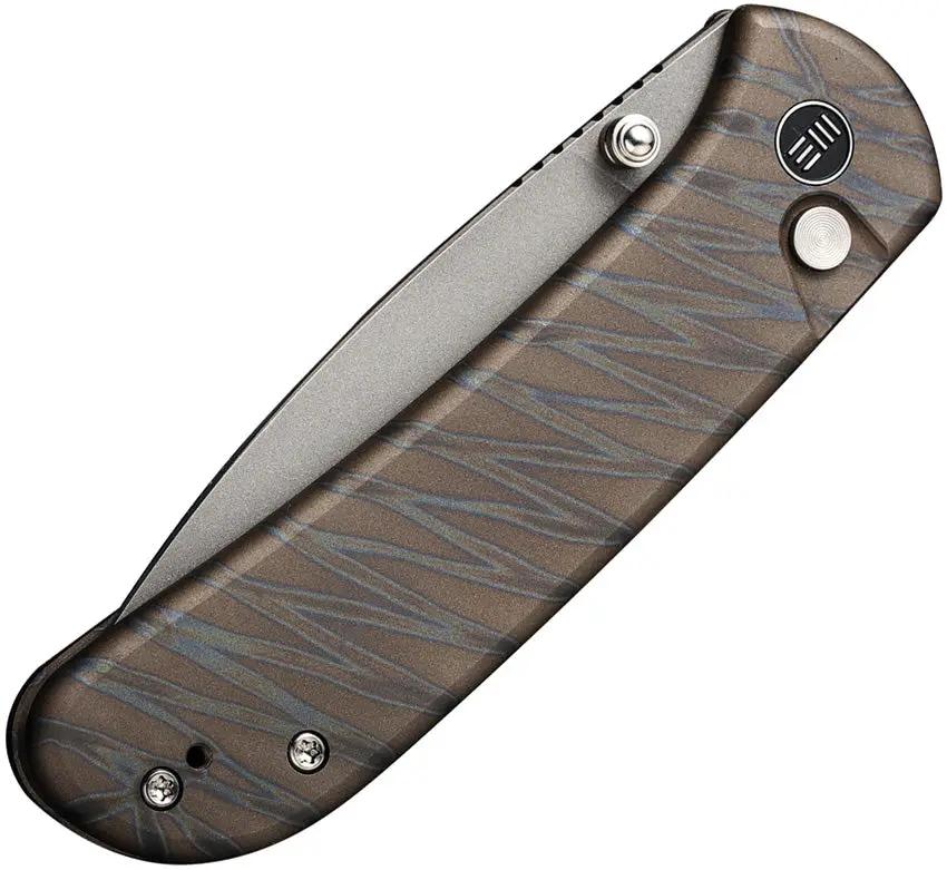 We Knife Qubit Button Lock Flame EDC Knife - Flame Anodized Titanium Handle And CPM-20CV Blade by We Knife Co Ltd
