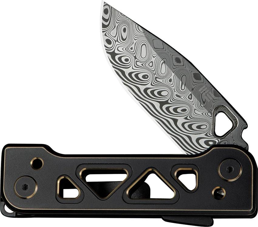 We Knife Tyro Superlock Premium Damasteel EDC Folding Knife With Black And Gold Titanium Handle For EDC Enthusiasts by We Knife Co Ltd