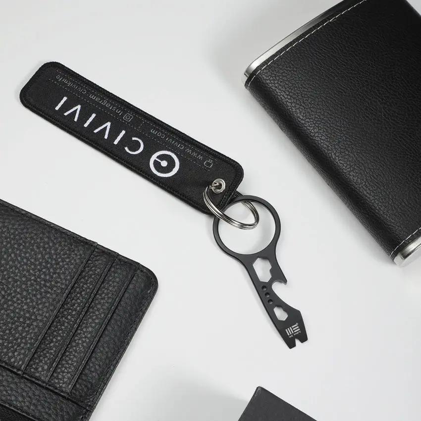 WE Knife Pry Bar Flight Tag Keychain - Free With 29 Knife Purchase Black Stainless Bottle Opener And Hex Wrenches by We Knife Co Ltd