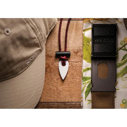 Wazoo Survival Gear Spark Necklace White - Ferro Rod Fire Starter With Ceramic Scraper And Quick Release Leather Cord by Wazoo Survival Gear